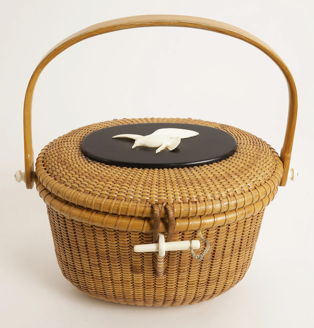 Stephen Gibbs (18961974) Oval Friendship Basket Ebony Top with Carved