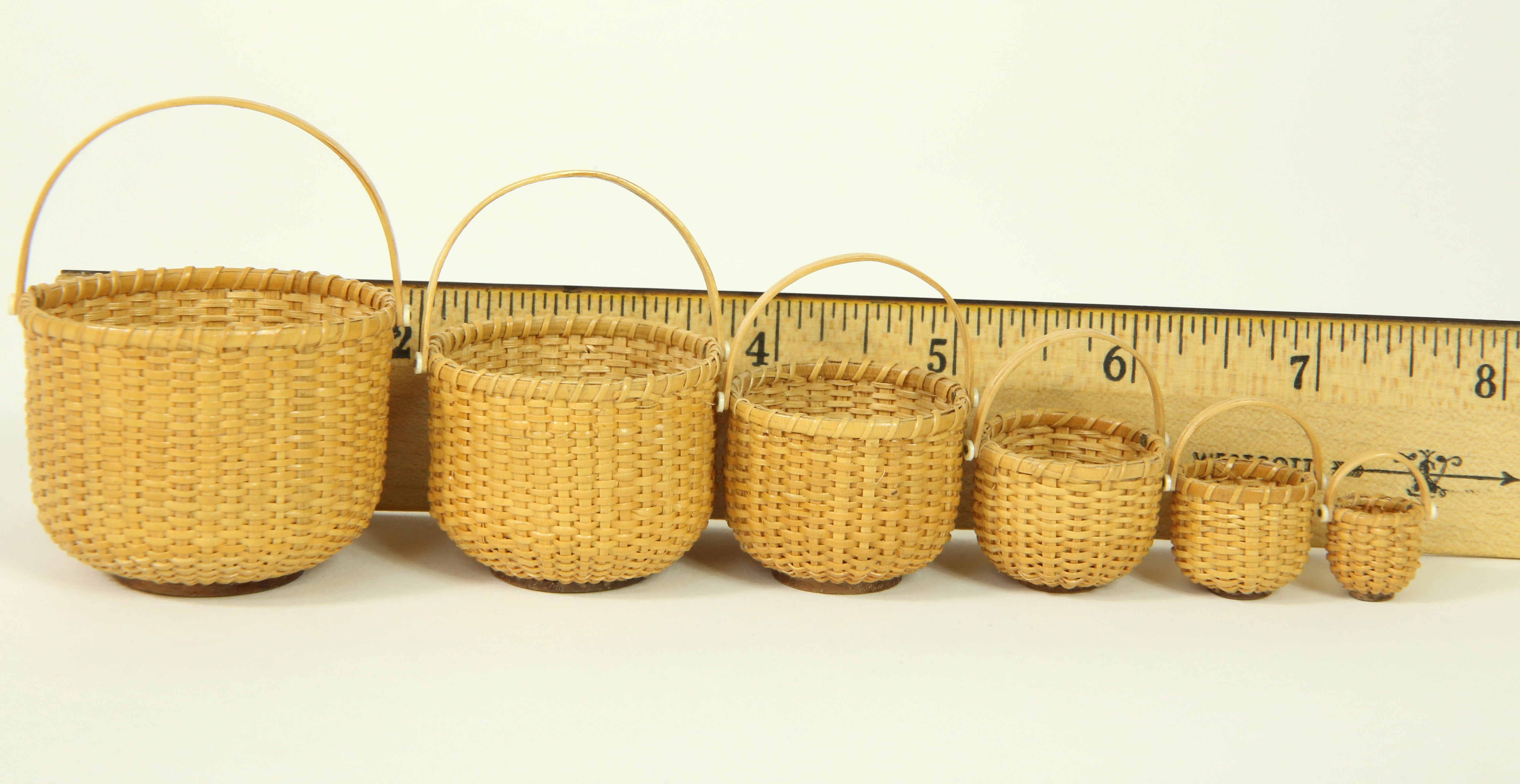Nest of Six Georgia Axt Miniature Nantucket Round Swing Handle