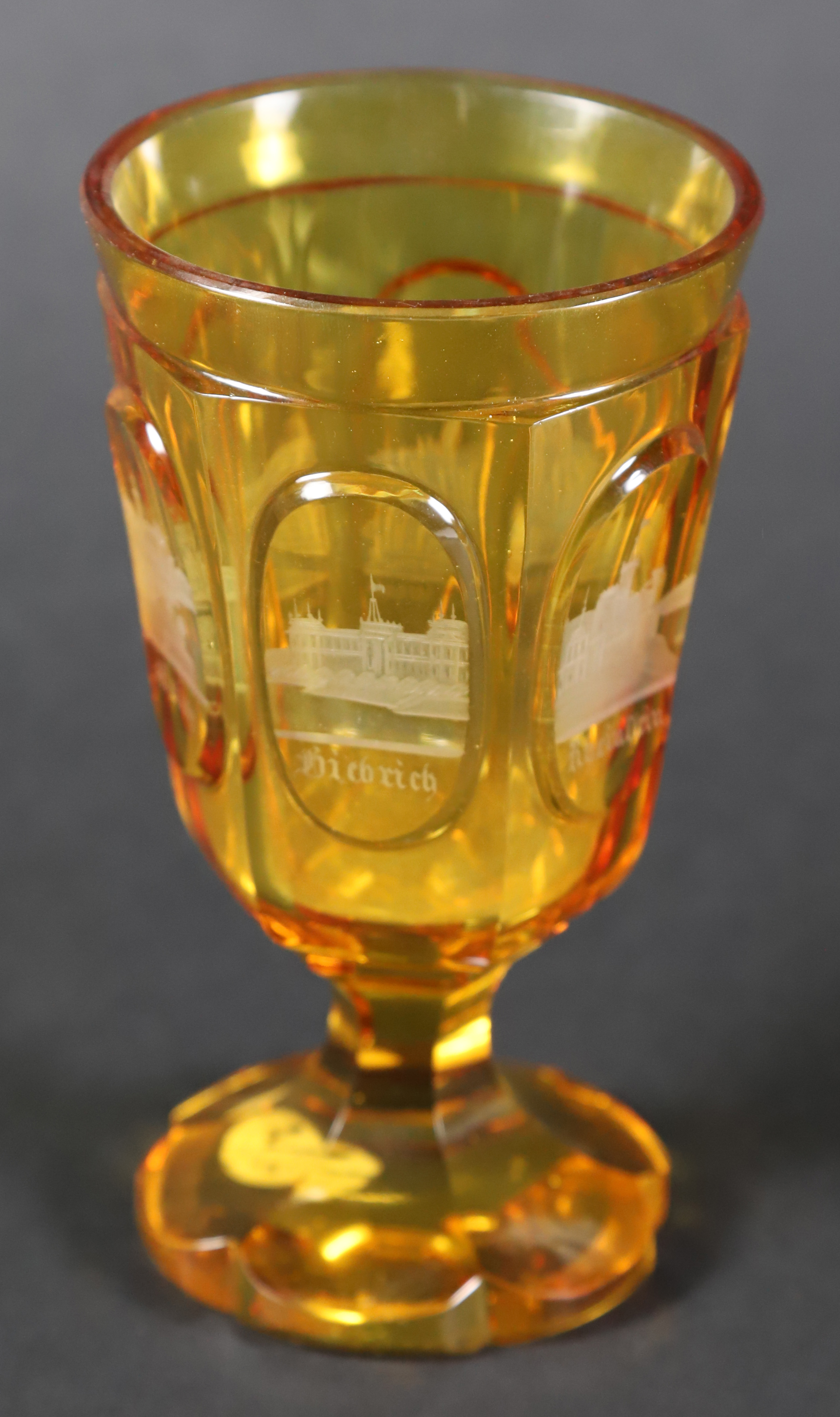 19th Century Bohemian Amber Glass Goblet With Etched City Decoraton 