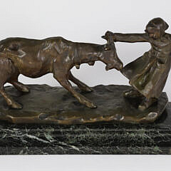 Cast Bronze Figural group of a Young Dutch Girl and a Goat