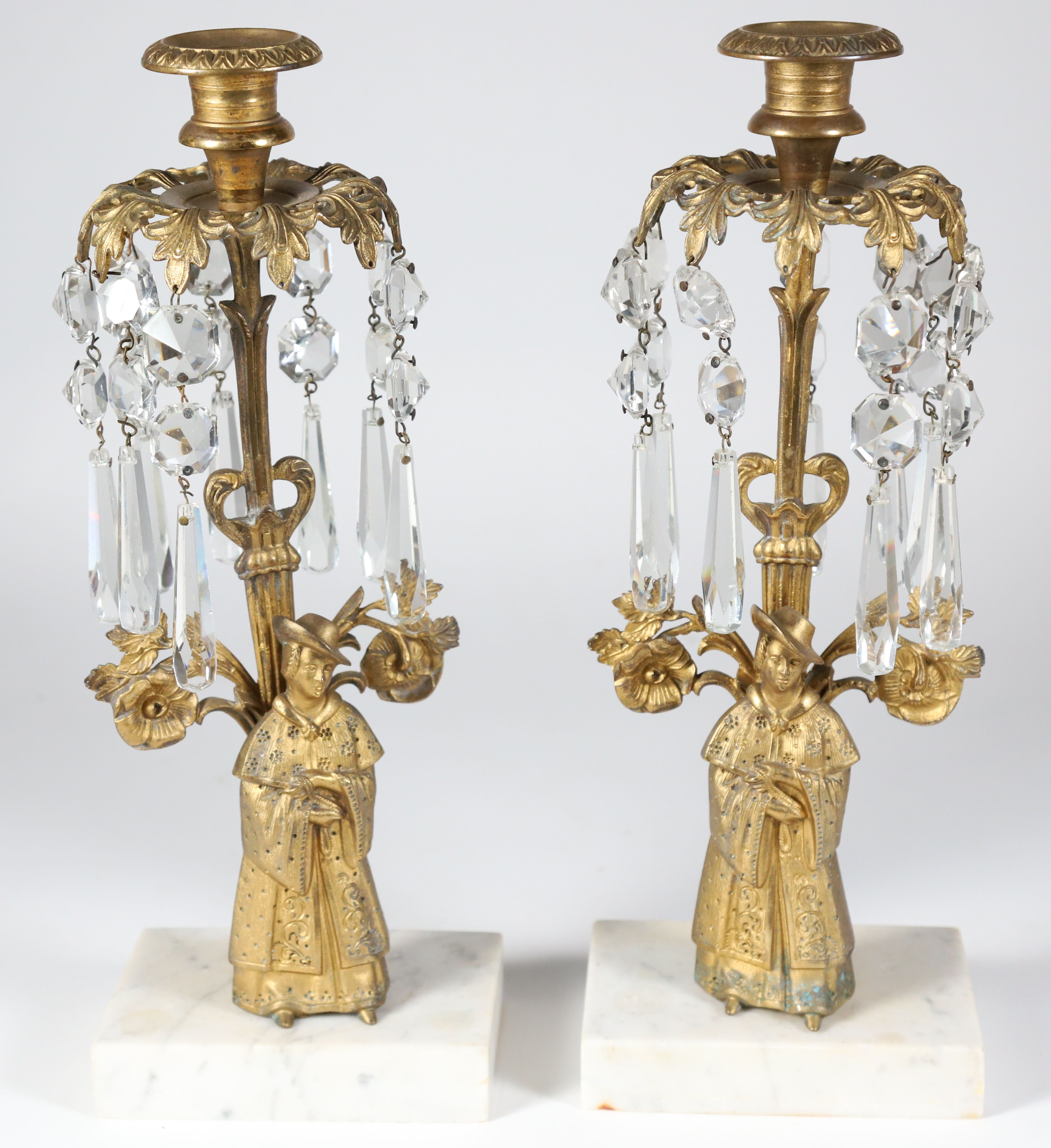 Pair of 19th Century Figural Bronze Girondales with Crystal Prisms on White Marble Bases