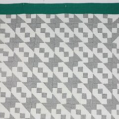 Pair of “Hour Glass” Pattern Patchwork Quilts with Green Borders, circa 1930s