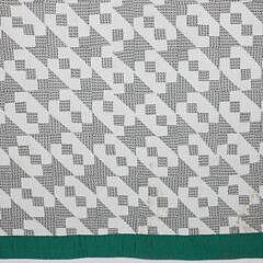 Pair of “Hour Glass” Pattern Patchwork Quilts with Green Borders, circa 1930s