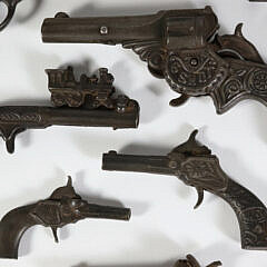 Collection of Twelve Antique American Cast Iron Cap Gun Toys, 19th Century
