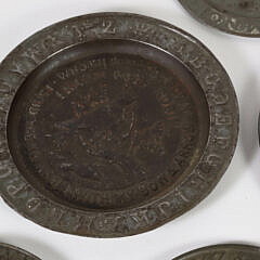 Six Embossed Tin Child’s Plates, 19th Century