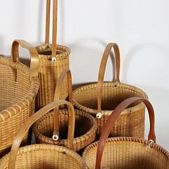 Collection of Approximately Thirty-One Hand Made Nantucket Baskets in Various Forms and Makers