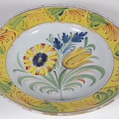 A Delft Blue and White Plate and Yellow Ground Delft Shallow Bowl, circa 1730