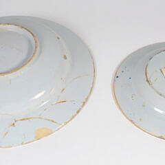 A Delft Blue and White Plate and Yellow Ground Delft Shallow Bowl, circa 1730