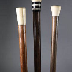 A Group of Antique Walrus Ivory Knob Walking Sticks