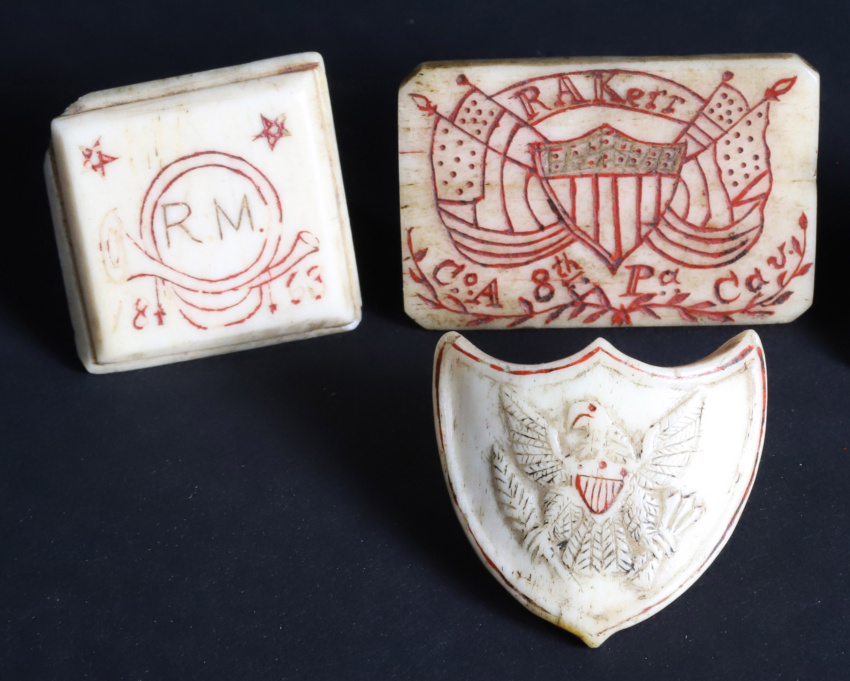 Collection of Three Whalemen Carved Antique Whale Ivory Going Ashore Neckerchief Slides, circa 1850s