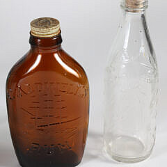 Nine Antique Bottles in Various Forms and Colors