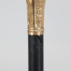 Repousse Gold Cane Fragment, 1883 Mounted in a Block of Wood