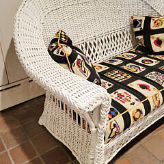 White Painted Wicker Sofa and Armchair with “Playing Card” Needlepoint Pillows