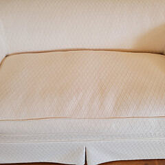 Designer Creme Upholstered Single Cushion Skirted Settee with Rolled Arms