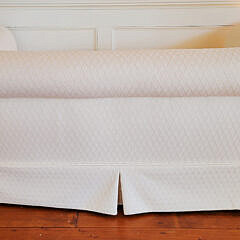 Designer Creme Upholstered Single Cushion Skirted Settee with Rolled Arms