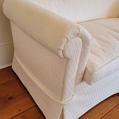 Designer Creme Upholstered Single Cushion Skirted Settee with Rolled Arms