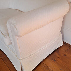Designer Creme Upholstered Single Cushion Skirted Settee with Rolled Arms