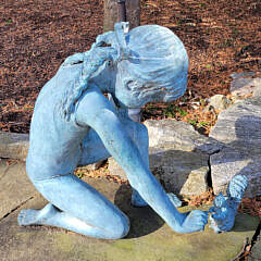 Bronze Sculpture of a Girl Feeding a Squirrel