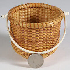 Jean M. Valerio Two-Egg Nantucket Basket, Scrimshaw Swing Handle “She Collects Seashells Down by the Seashore”