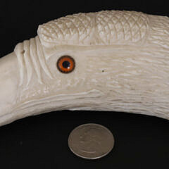 Antique Sperm Whale Tooth Carved as an Eagle Head, 19th Century