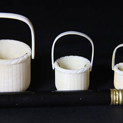 Nest of Three Miniature Carved Bone Open Swing Handle Baskets