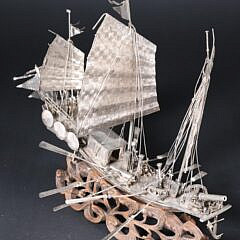 Antique Chinese Silver Model of a War Junk on Carved Teak Wood Ocean Wave Base