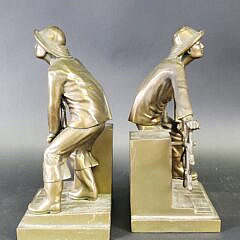 Pair of Jennings Brothers Bronze Clad Figural Gloucester Fisherman Bookends, 20th century