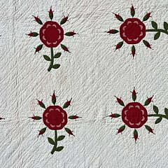 Very Fine Red and Green Floral Applique and Trapunto Quilt, Mid 19th Century