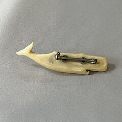 Signed Charlie Sayle Sr. Carved Sperm Whale Pin and Seahorse Pendant, circa 1952