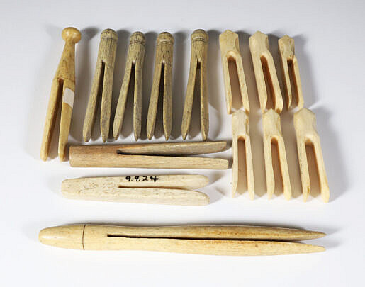 Fourteen Assorted Whale Bone Clothes Pins, 19th Century