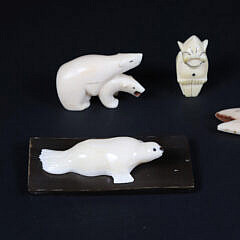 Group of Six Inuit Bone and Antique Walrus Ivory Animals and Figures, 19th / 20th Century