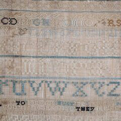 1789 Sampler “Animals Around a Flourishing Tree” in Bird’s Eye Maple Frame