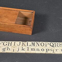 Two Complete Sets of Antique Whalebone Alphabet Tiles, 19th century