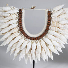 Two Bali Shell Bibs