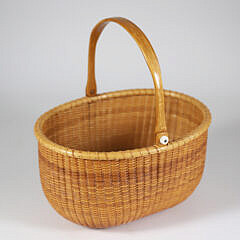 Bill and Judy Sayle Oval Nantucket Basket with Swing Handle, circa 1982