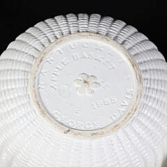 Two George Davis White Glazed Ceramic Nantucket Baskets
