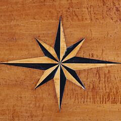 Leonard’s Tiger Maple Coffee Table With Compass Rose Design