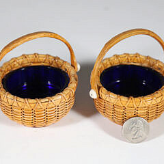 Pair of Paul Willer Nantucket Basket Woven Open Salts with Swing Handles and Cobalt Glass Liners