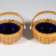 Pair of Paul Willer Nantucket Basket Woven Open Salts with Swing Handles and Cobalt Glass Liners