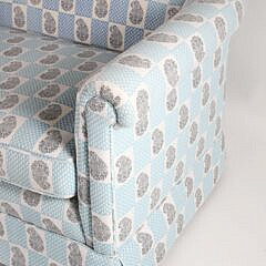 Blue and White Upholstered Rolled Arm Single Cushion Skirted Sofa