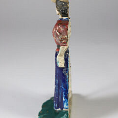 Painted Cast Iron Lady Golfer Doorstop