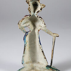 Painted Cast Iron Lady Golfer Doorstop