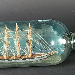 Vintage Sailor Made Four-Masted Ship in a Bottle, 20th century