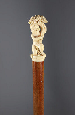 Finely Carved Child Holding Horn of Plenty Walking Stick, 19th Century