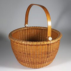 O.L. Whitamore Open Round Swing Handle Nantucket Basket