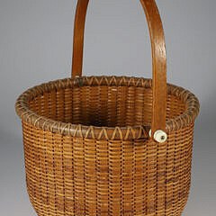O.L. Whitamore Round Open Swing Handle Nantucket Basket, circa 1979