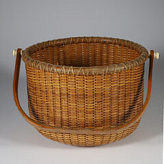 O.L. Whitamore Round Open Swing Handle Nantucket Basket, circa 1979