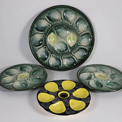 Group of Four Oyster Plates