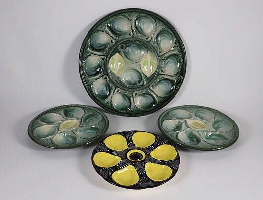 Group of Four Oyster Plates