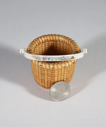Jean M. Valerio Woven Miniature Open Swing Handle Basket, circa 2007